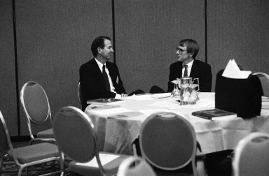 John Doerr, a Kleiner Perkins partner (right), in conversation with an unidentified colleague., John Doerr, a Kleiner Perkins partner (right), in conversation with an unidentified colleague.